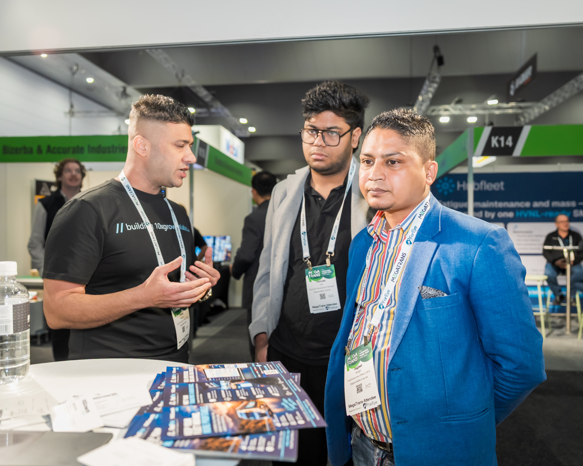 FleetPro team member in conversation with a transport operator at MEGATRANS Melbourne